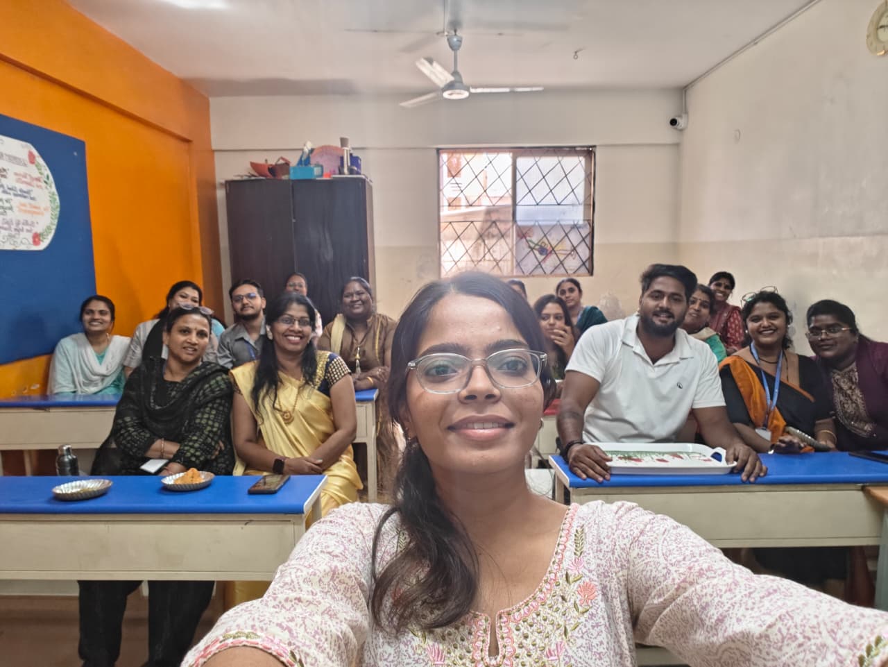 A GSP fellow with children during a session