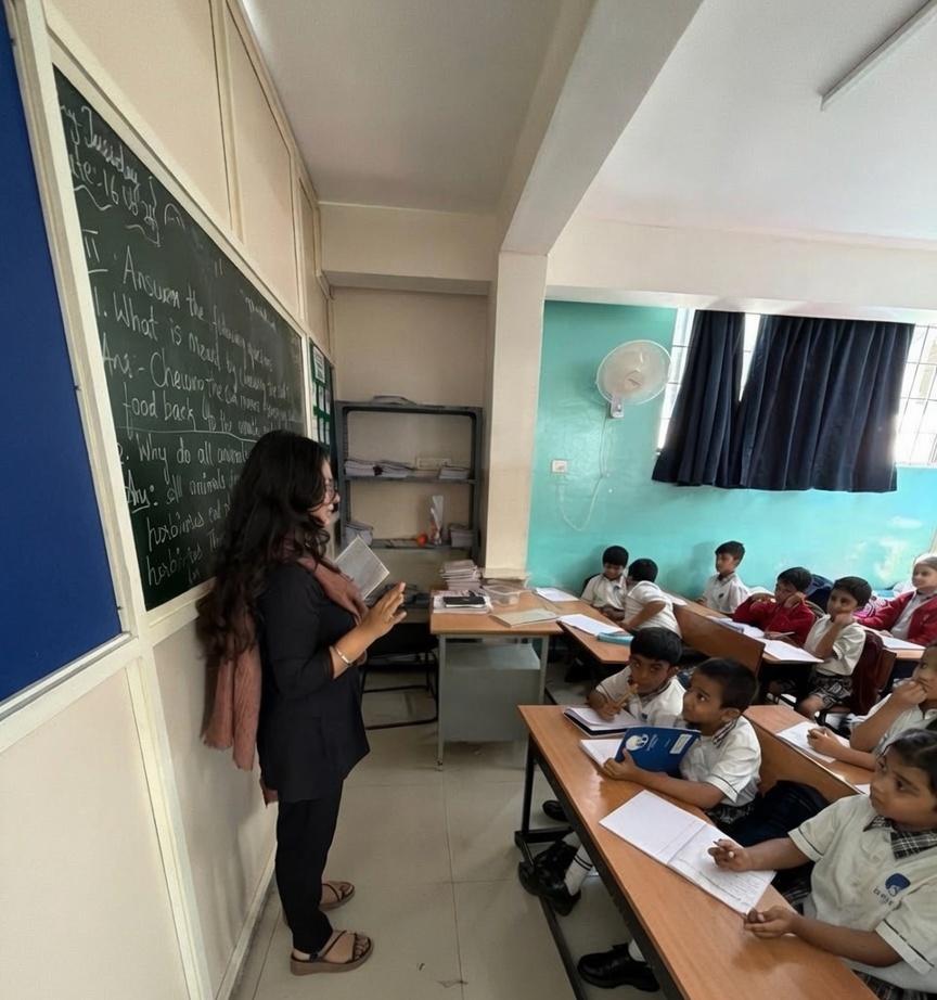 Fellows leading a group workshop with students